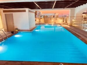 Custom swimming pool construction in Etihad Village, Dubai — Poolsco Landscaping