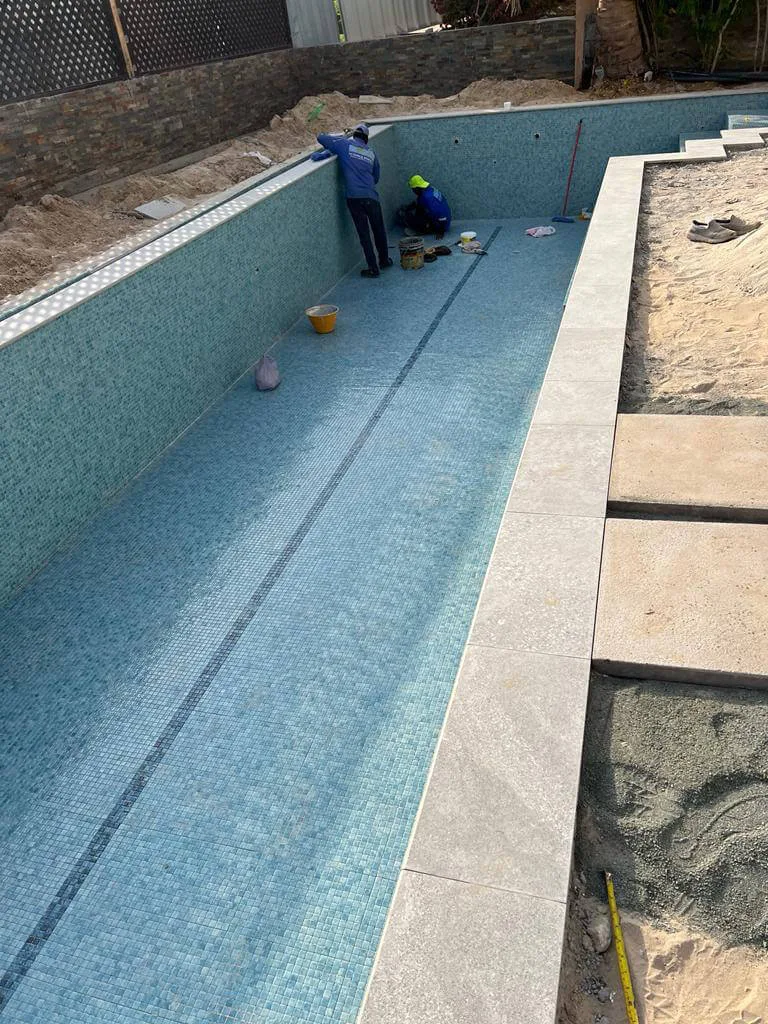 Swimming Pool & Landscaping Company in Dubai Hardscaping and paving works in progress in Dubai — Poolsco Landscaping