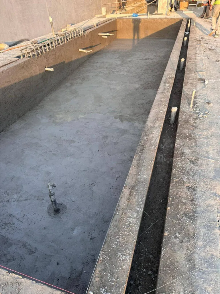 Swimming Pool & Landscaping Company in Dubai Outdoor living area construction underway in Dubai — Poolsco Landscaping