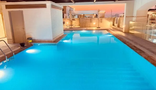Swimming Pool & Landscaping Company in Dubai Custom swimming pool construction in Etihad Village Dubai — Poolsco Landscaping