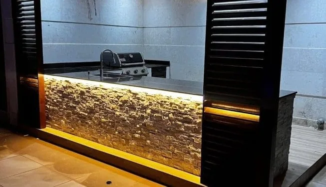 Swimming Pool & Landscaping Company in Dubai Outdoor BBQ counter and kitchen installation in Dubai villa — Poolsco Landscaping